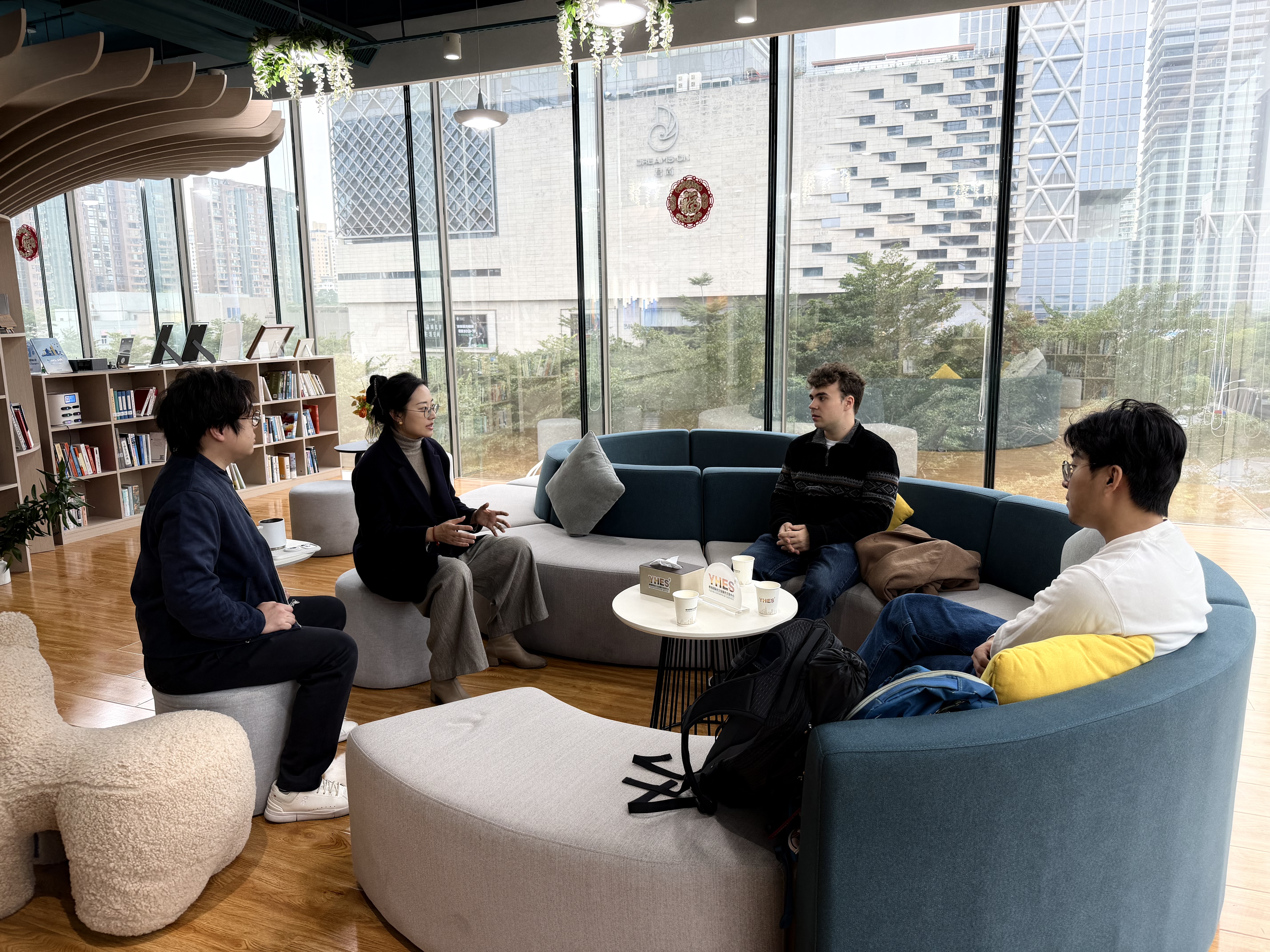 Visitors and local hosts in conversation during a business visit in Shenzhen