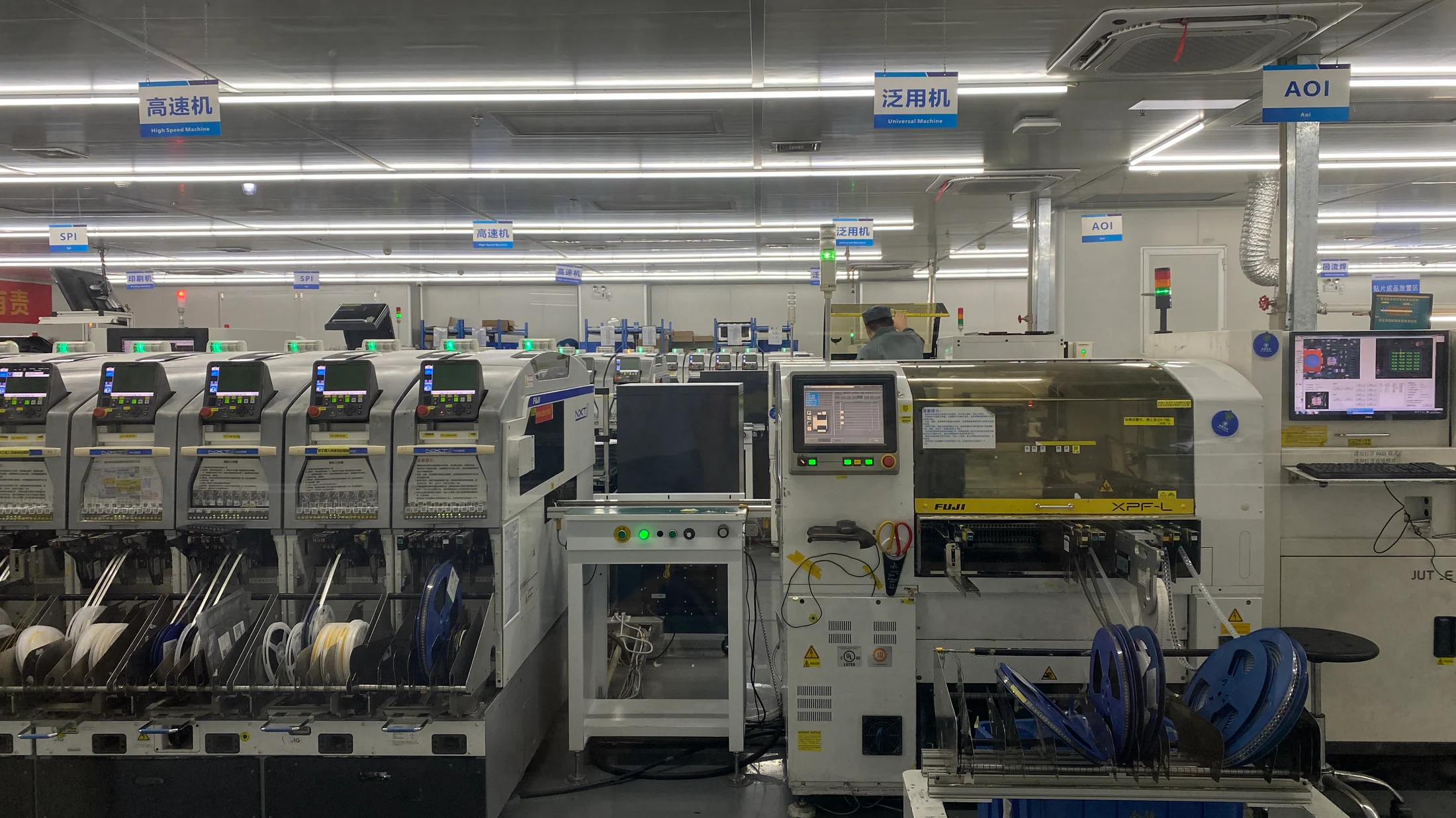 SMT assembly equipment on a Shenzhen production line
